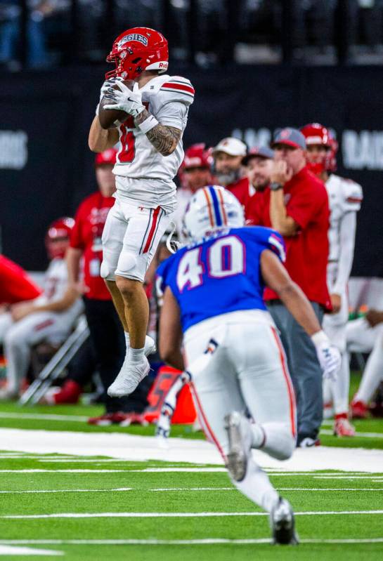 Arbor View wide receiver Jayden Williams (6) elevates for a catch as Bishop Gorman linebacker C ...