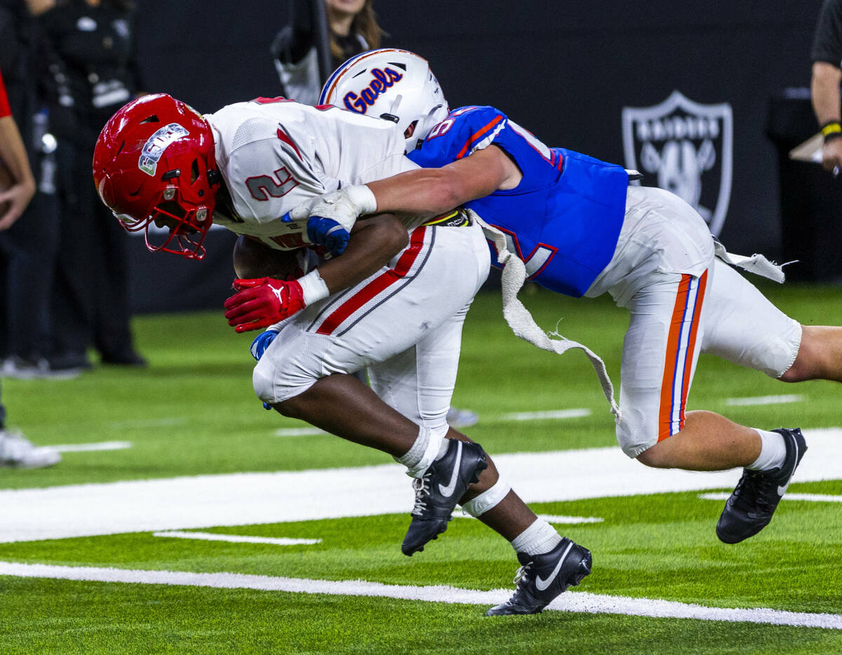 Arbor View running back Sean Moore (2) scores their on points of the night as Bishop Gorman lin ...