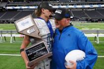 Pahranagat Valley quarterback Jesse Stewart (5) and head coach Brett Hansen congratulate each o ...