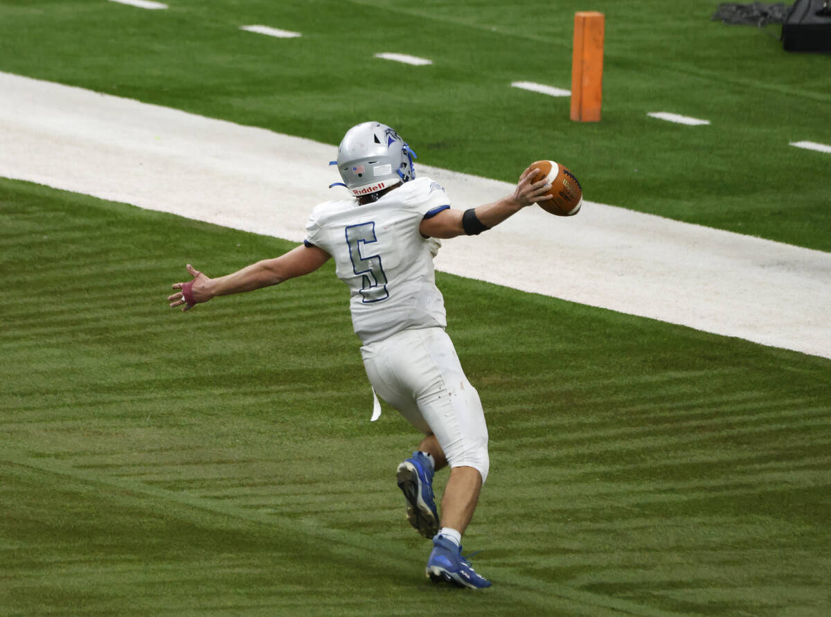 Pahranagat Valley quarterback Jesse Stewart (5) reacts as he scores a touchdown against Tonopah ...