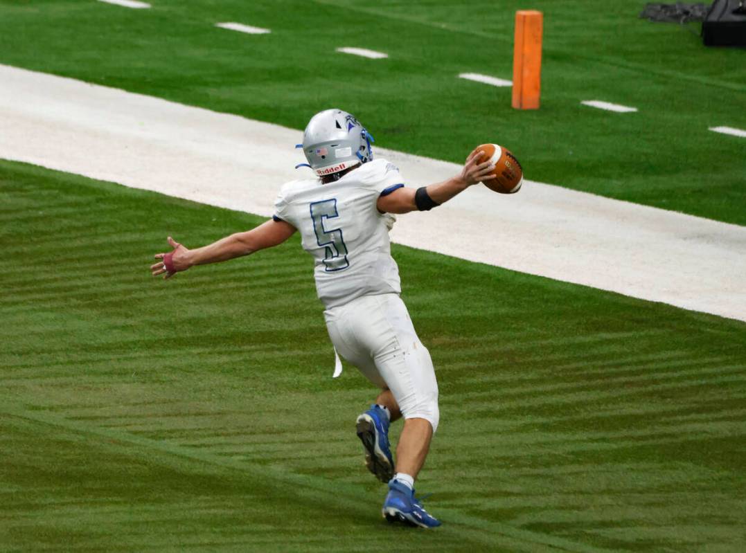 Pahranagat Valley quarterback Jesse Stewart (5) reacts as he scores a touchdown against Tonopah ...