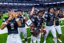 Mojave players celebrate their 30-6 win over Canyon Springs during their Class 4A football stat ...