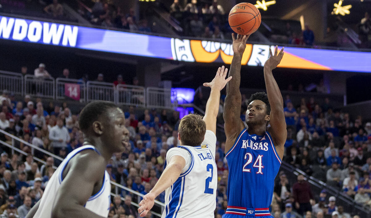 Kansas Jayhawks forward KJ Adams Jr. (24) attempts a shot during the Vegas Showdown college bas ...