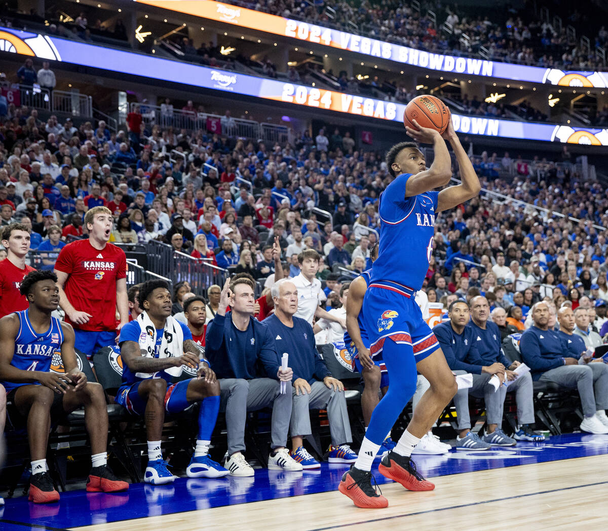 Kansas Jayhawks guard Rylan Griffen (6) attempts a three-point shot during the Vegas Showdown c ...