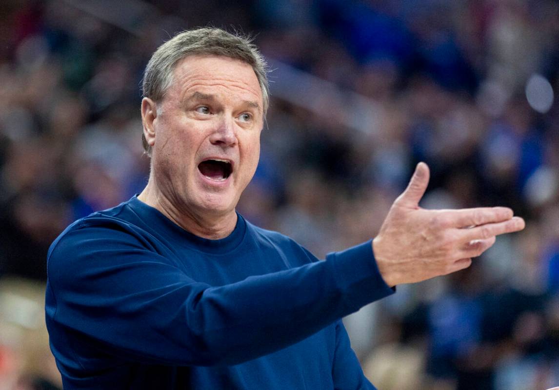 Kansas Jayhawks head coach Bill Self talks to the team during the Vegas Showdown college basket ...