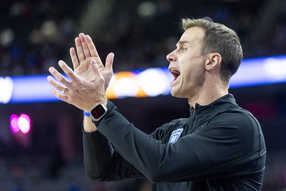 Duke Blue Devils head coach Jon Scheyer cheers on his team during the Vegas Showdown college ba ...