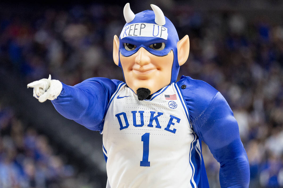 Duke’s Blue Devil helps cheer up the crowd during the Vegas Showdown college basketball ...