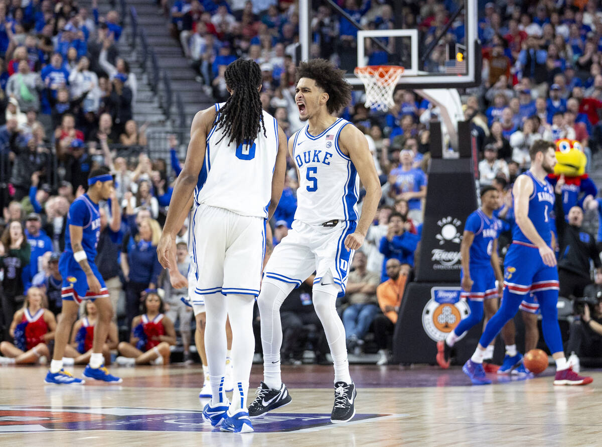 Duke Blue Devils guard Tyrese Proctor (5) celebrates with forward Maliq Brown (6) during the Ve ...