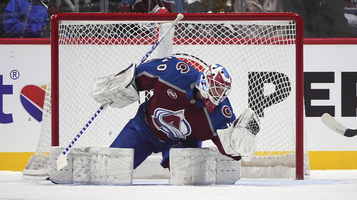 Colorado Avalanche goaltender Alexandar Georgiev makes a glove save in the first period of an N ...