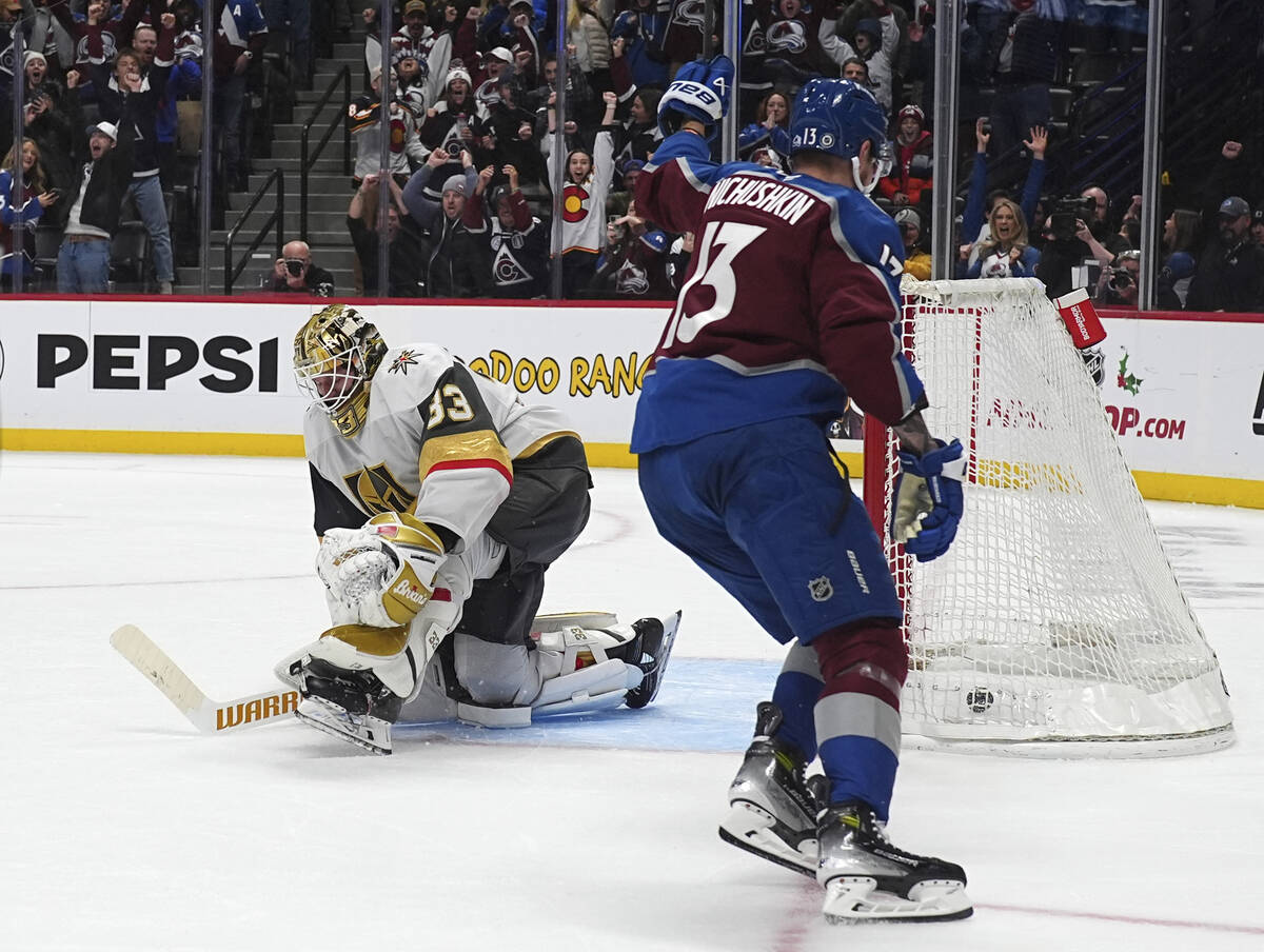 Vegas Golden Knights goaltender Adin Hill, left, reacts as Colorado Avalanche right wing Valeri ...