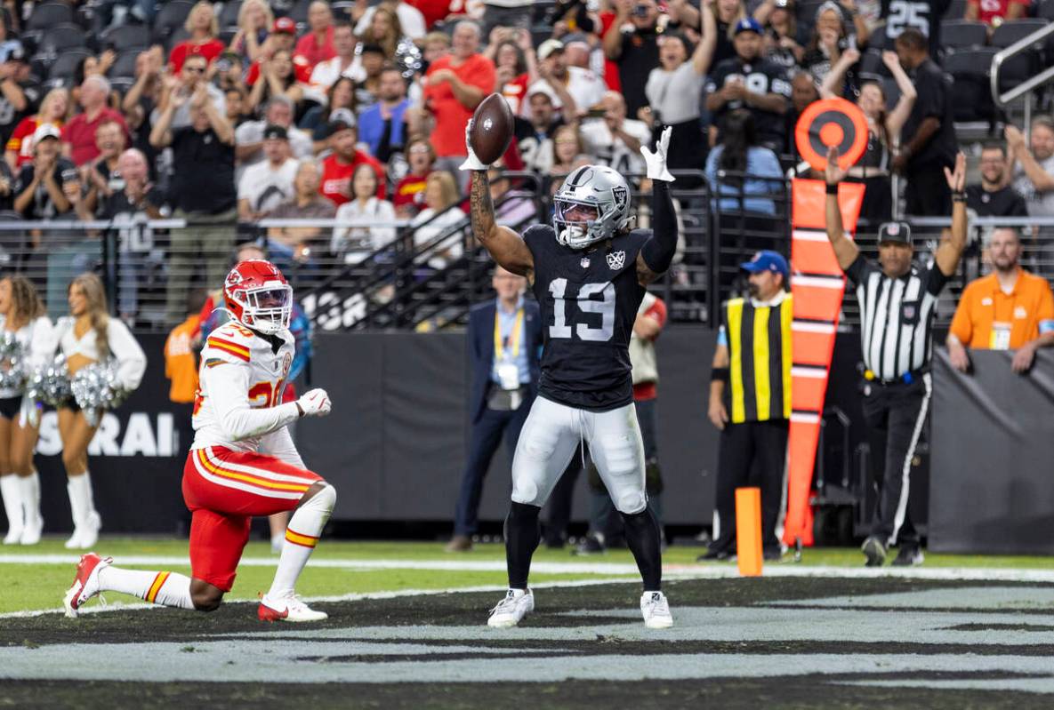 Raiders wide receiver DJ Turner (19) celebrates after scoring a touchdown during the second hal ...