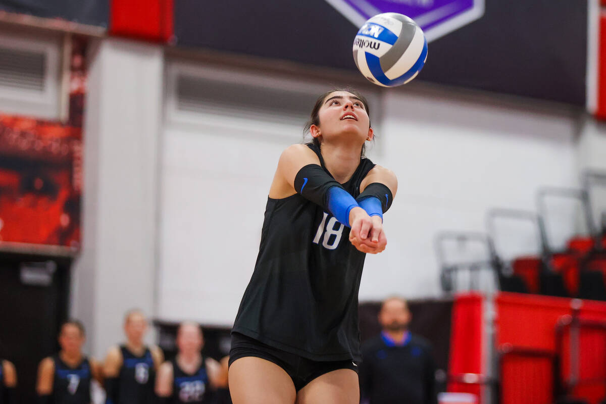 Boise State outside hitter Anabel Kotzakov (18) hits the ball during a first round game between ...