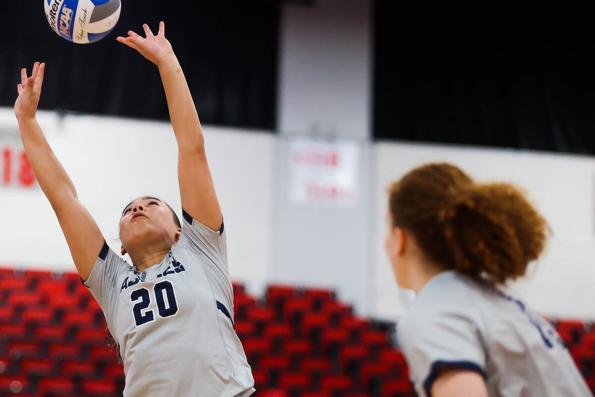 Utah State setter Kaylie Kofe (20) reaches for the ball during a first round game between the U ...