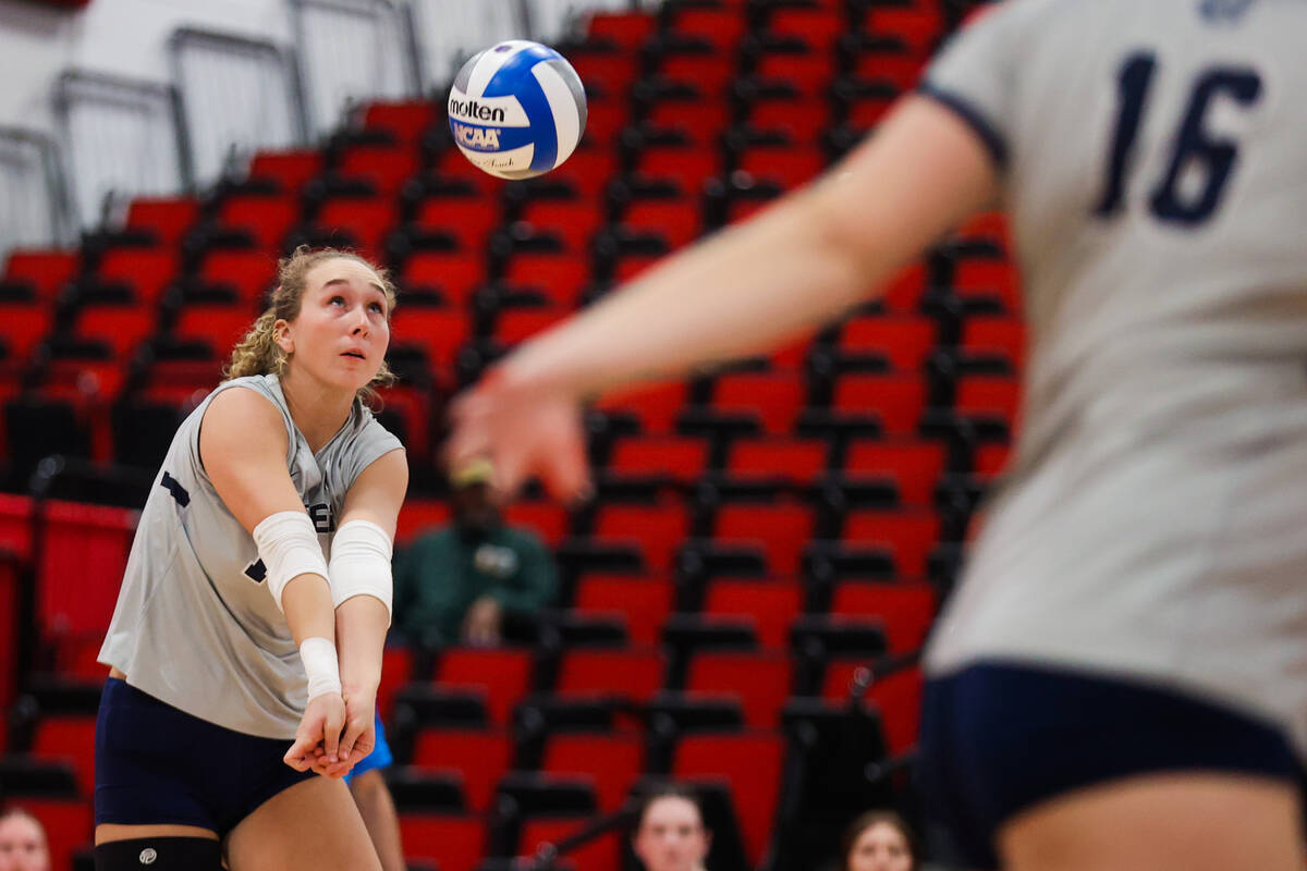 Utah State outside hitter Delaney Lawson bumps the ball during a first round game between the U ...