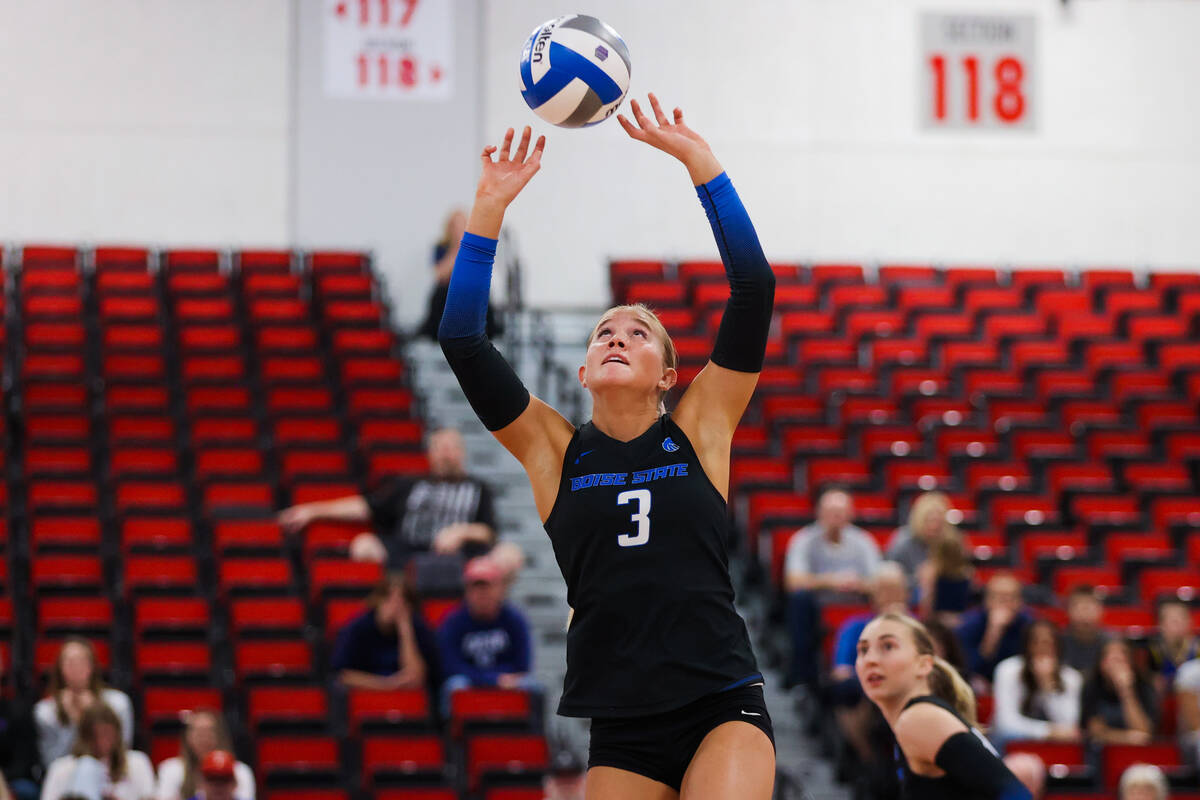 Boise State setter Lilli Etter (3) hits the ball during a first round game between the Utah Sta ...