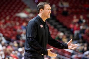 UNLV head coach Kevin Kruger yells during the college basketball game against the Omaha Maveric ...