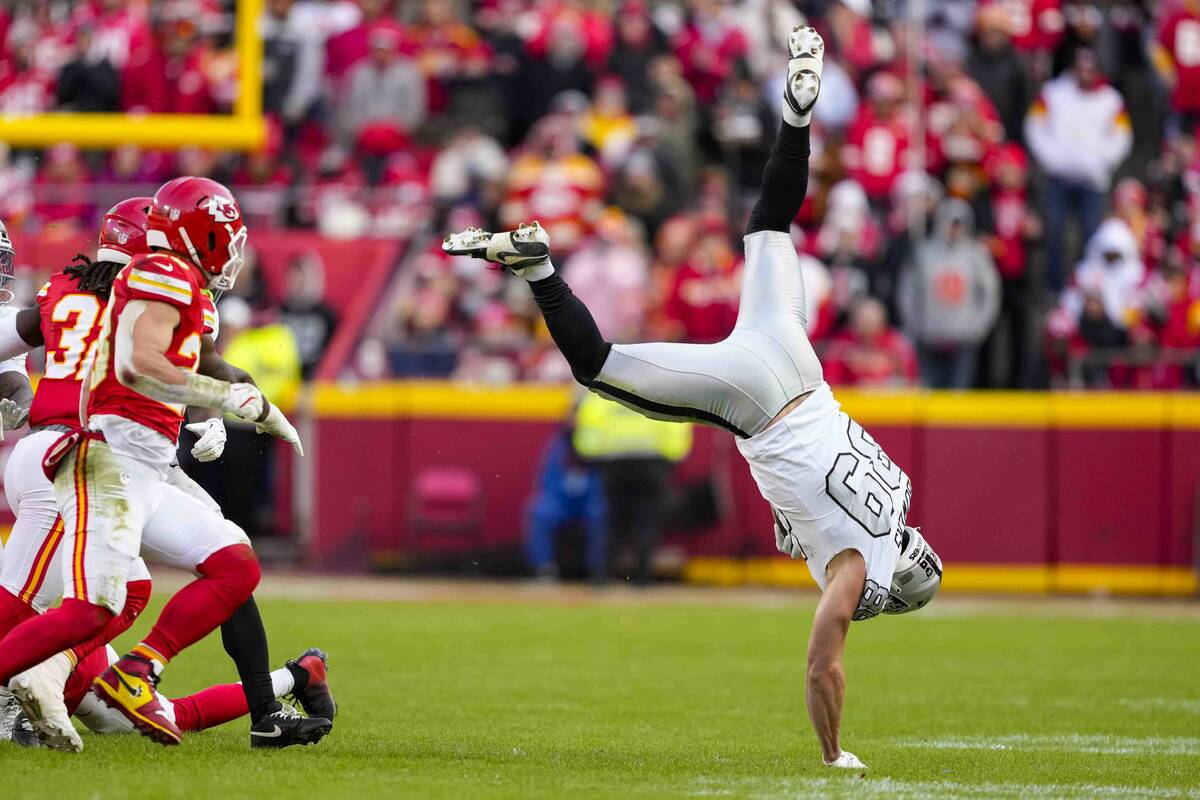 Las Vegas Raiders tight end Brock Bowers (89) hits the ground after catch against the Kansas Ci ...