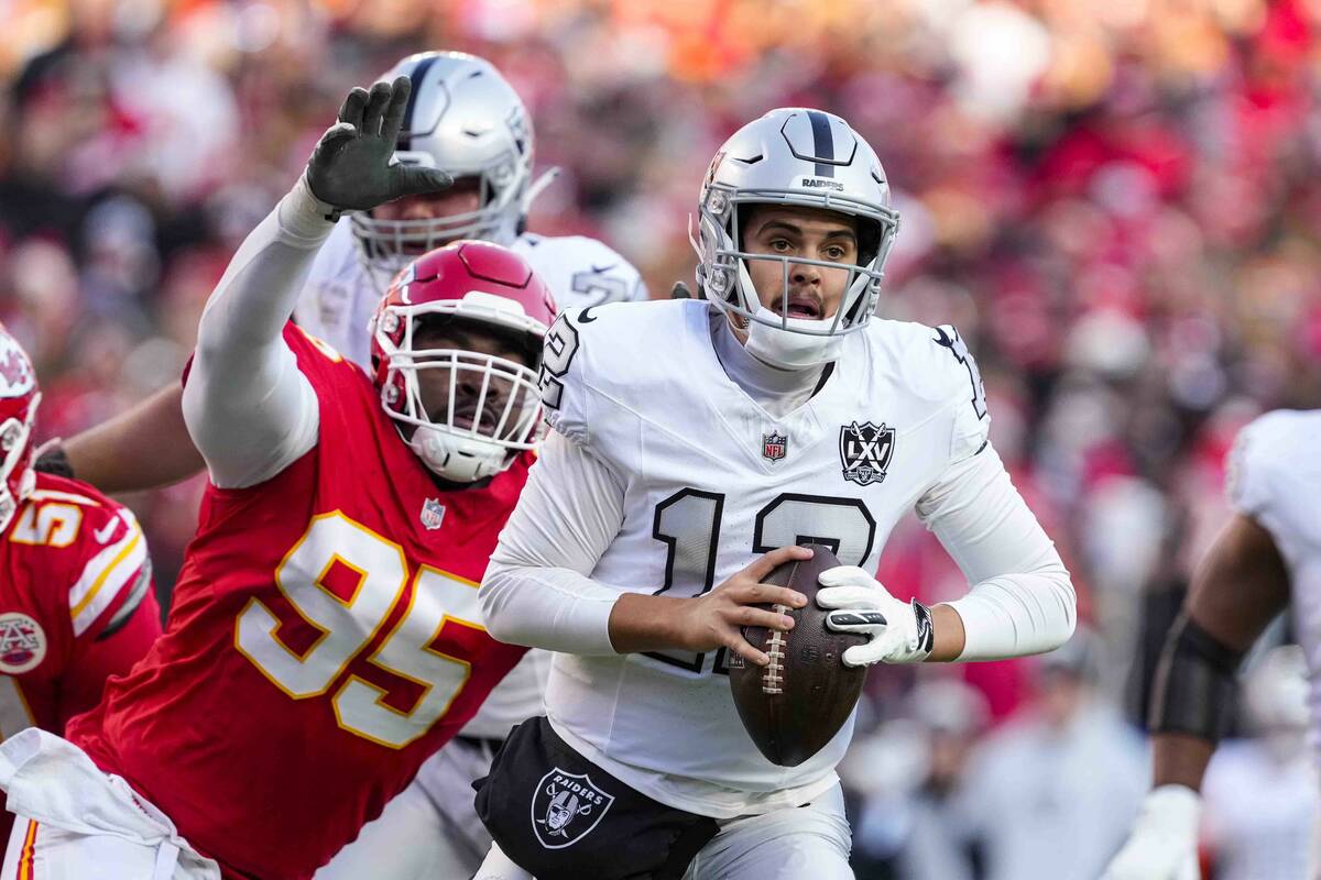 Kansas City Chiefs defensive tackle Chris Jones (95) pressures Las Vegas Raiders quarterback Ai ...