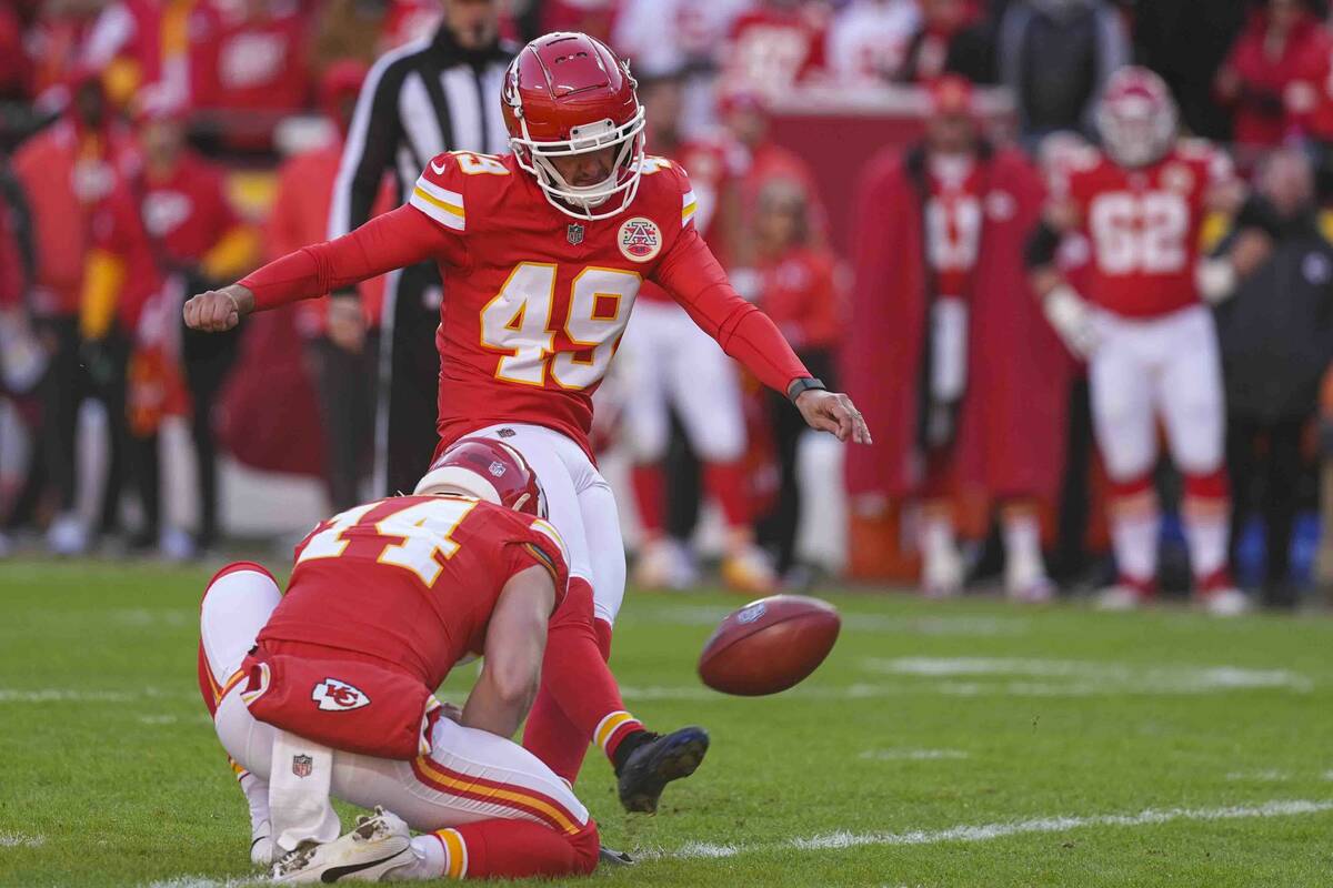 Kansas City Chiefs kicker Matthew Wright (49) kicks a field goal from the hold of punter Matt A ...