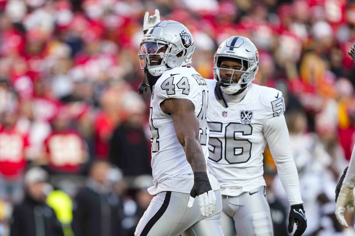 Las Vegas Raiders defensive end K'Lavon Chaisson (44) celebrates after a sack against the Kansa ...