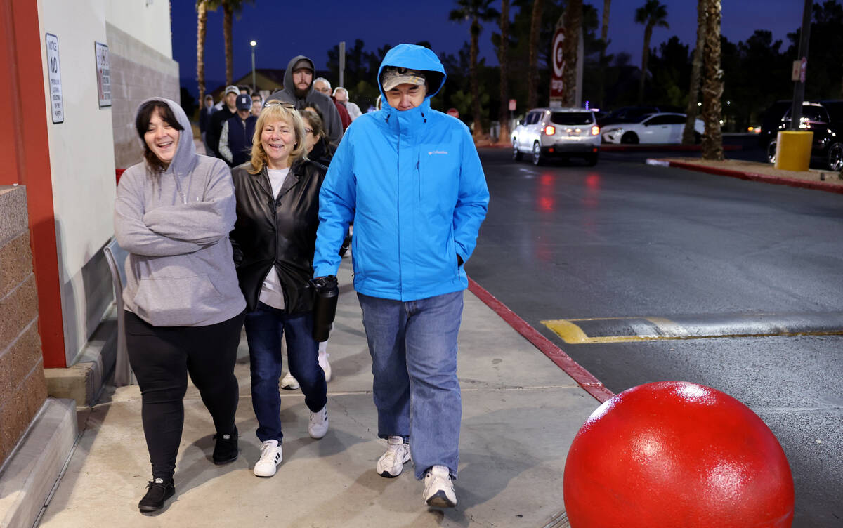 Black Friday shoppers file in for the 6 a.m. opening of the Target store on South Eastern in La ...