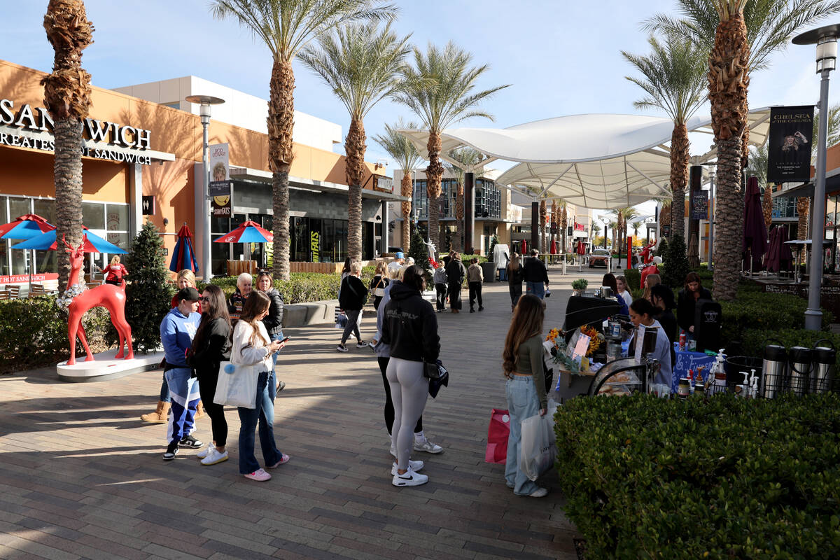 People line up for coffee while shopping at Downtown Summerlin in Las Vegas on Black Friday, No ...