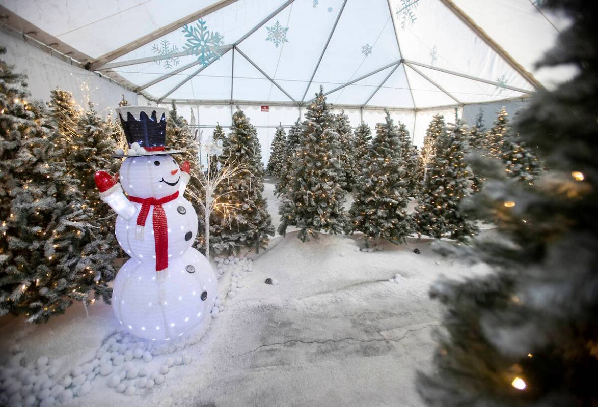 Setup continues before the opening of Christmas on the Strip, Friday, Nov. 29, 2024, in Las Veg ...