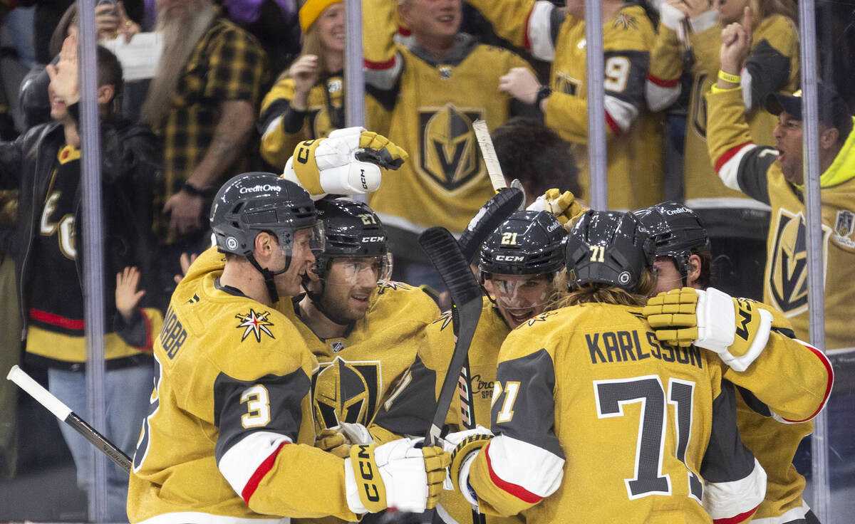 The Golden Knights celebrate a goal during the NHL hockey game against the Winnipeg Jets at T-M ...