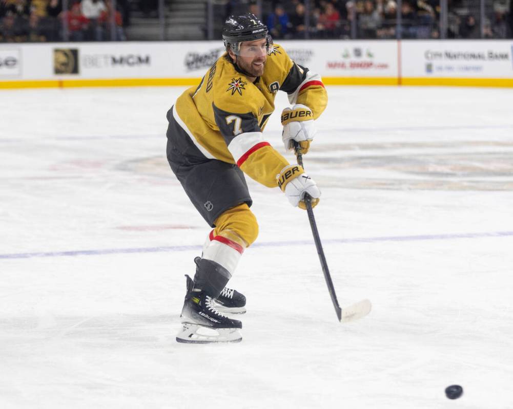 Golden Knights defenseman Alex Pietrangelo (7) passes the puck during the NHL hockey game again ...