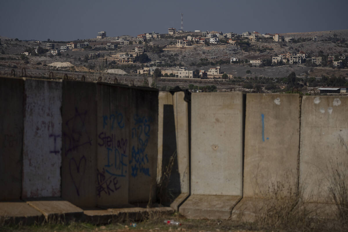 Damaged buildings stand on an area in southern Lebanon, during the ceasefire between Israel and ...