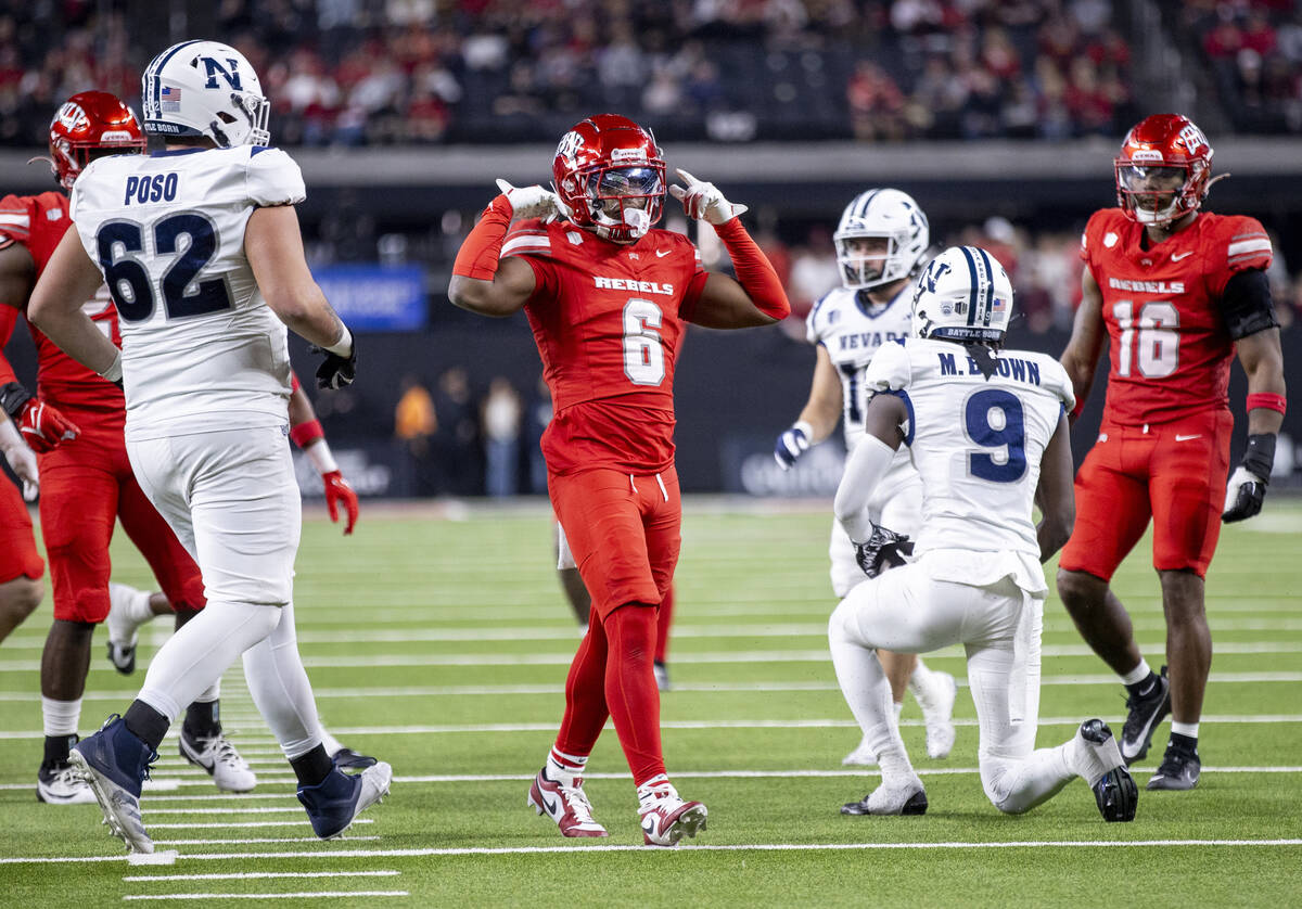 UNLV defensive back Jeremiah Vessel (6) celebrates a big hit during the NCAA college football g ...