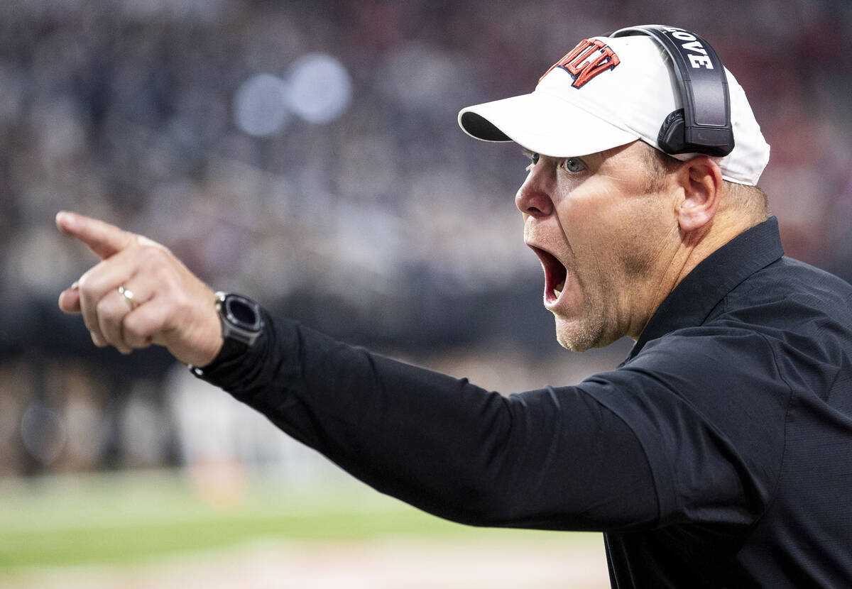 UNLV head coach Barry Odom yells at a referee during the NCAA college football game against UNR ...