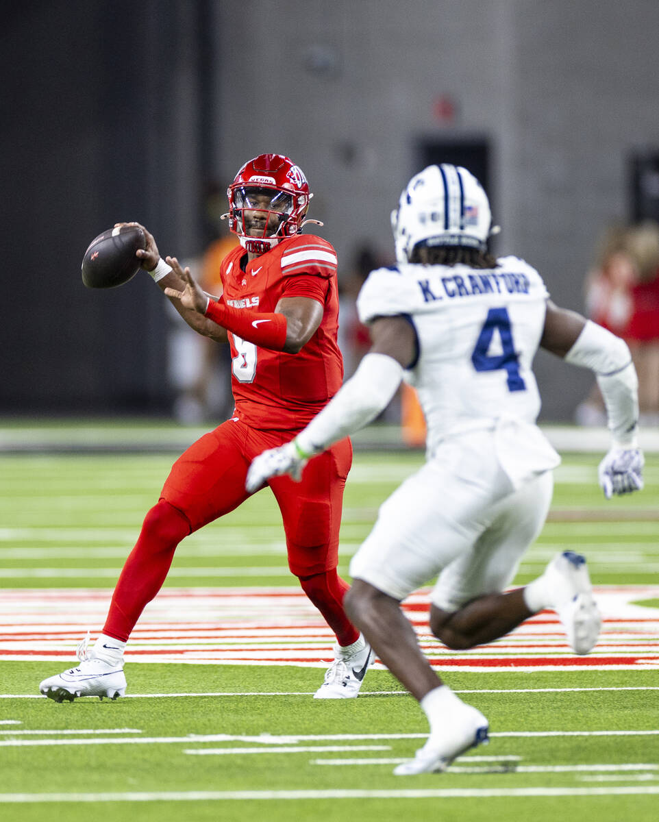 UNLV quarterback Hajj-Malik Williams (6) looks to throw the ball during the NCAA college footba ...