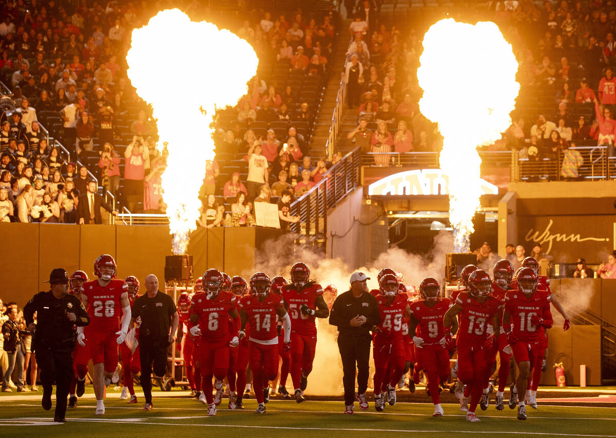 UNLV enters the field before the 50th ‘Battle for the Fremont Cannon’ NCAA colleg ...