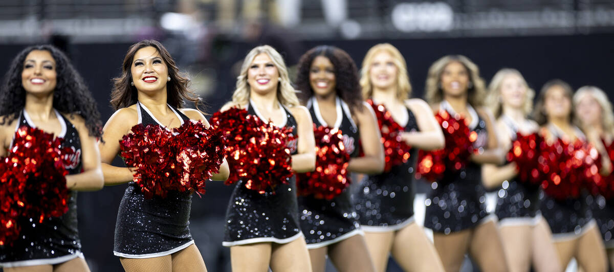 The UNLV Scarlet Dance Line performs before the NCAA college football game against UNR at Alleg ...