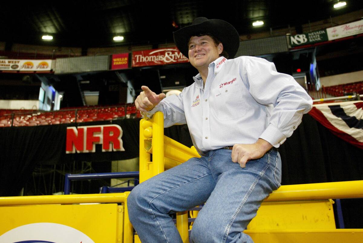 Cowboy Joe Beaver talks with friends while visiting the Thomas & Mack Center Thursday December ...