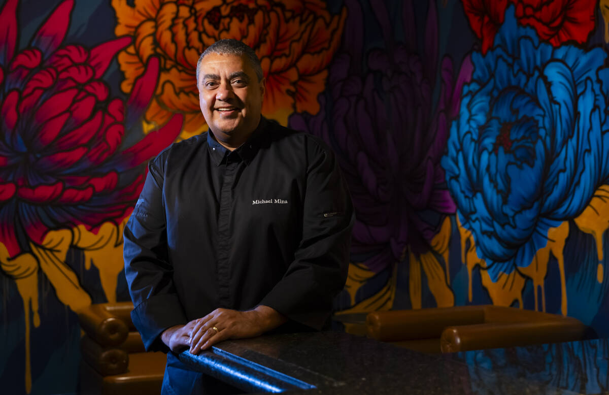 Chef Michael Mina poses for a portrait at his new restaurant, Bourbon Steak, at the Four Season ...