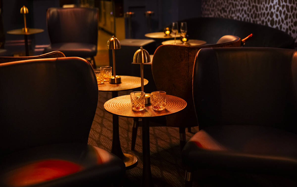 A lounge area adjacent to the bar is seen at Bourbon Steak at the Four Seasons on Monday, Dec. ...