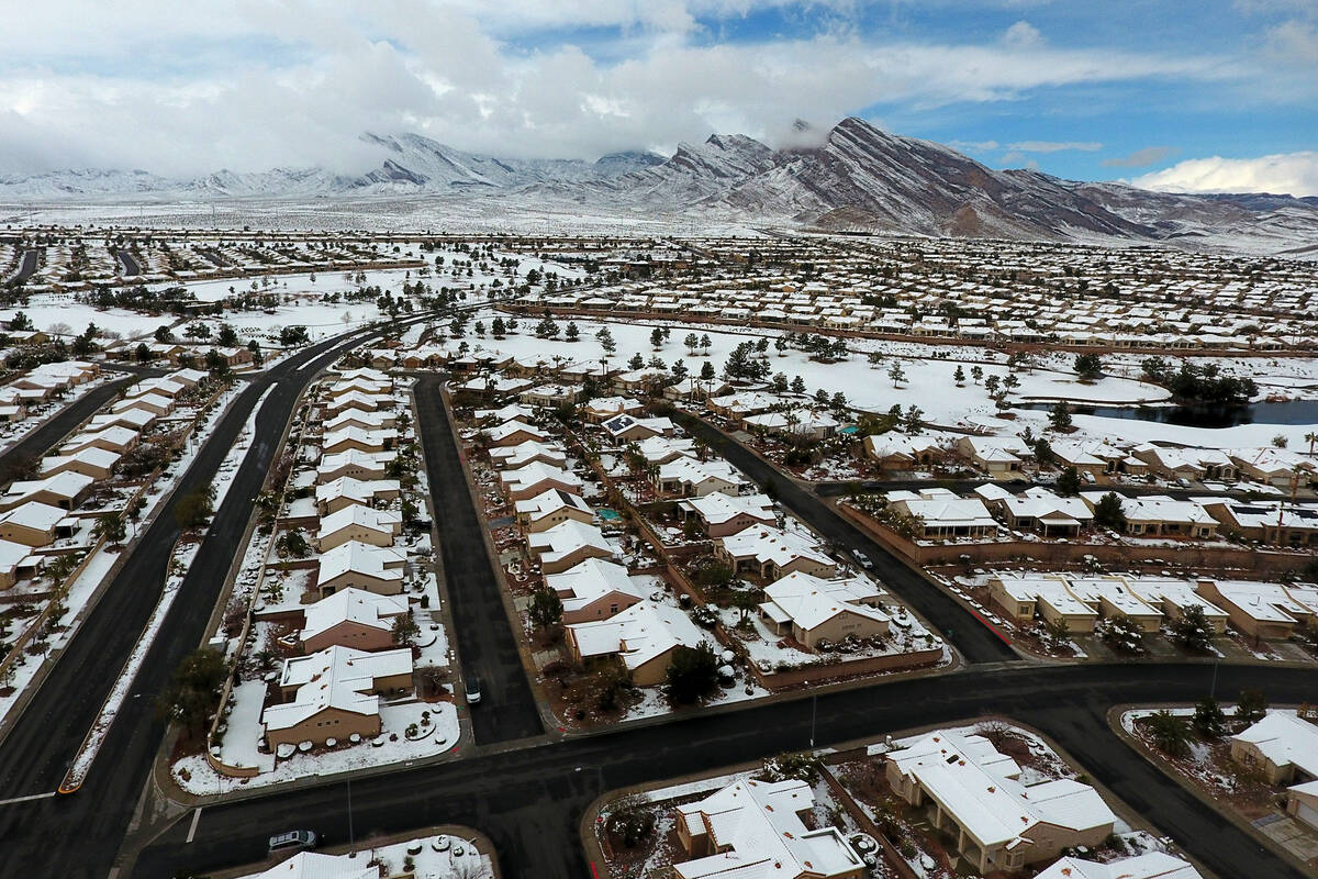 An aerial photo of Summerlin homes after a winter storm dropped a blanket of snow on the west L ...