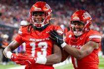 UNLV defensive back Jarvis Ware (13) and defensive back Jalen Catalon (1) celebrate a play duri ...