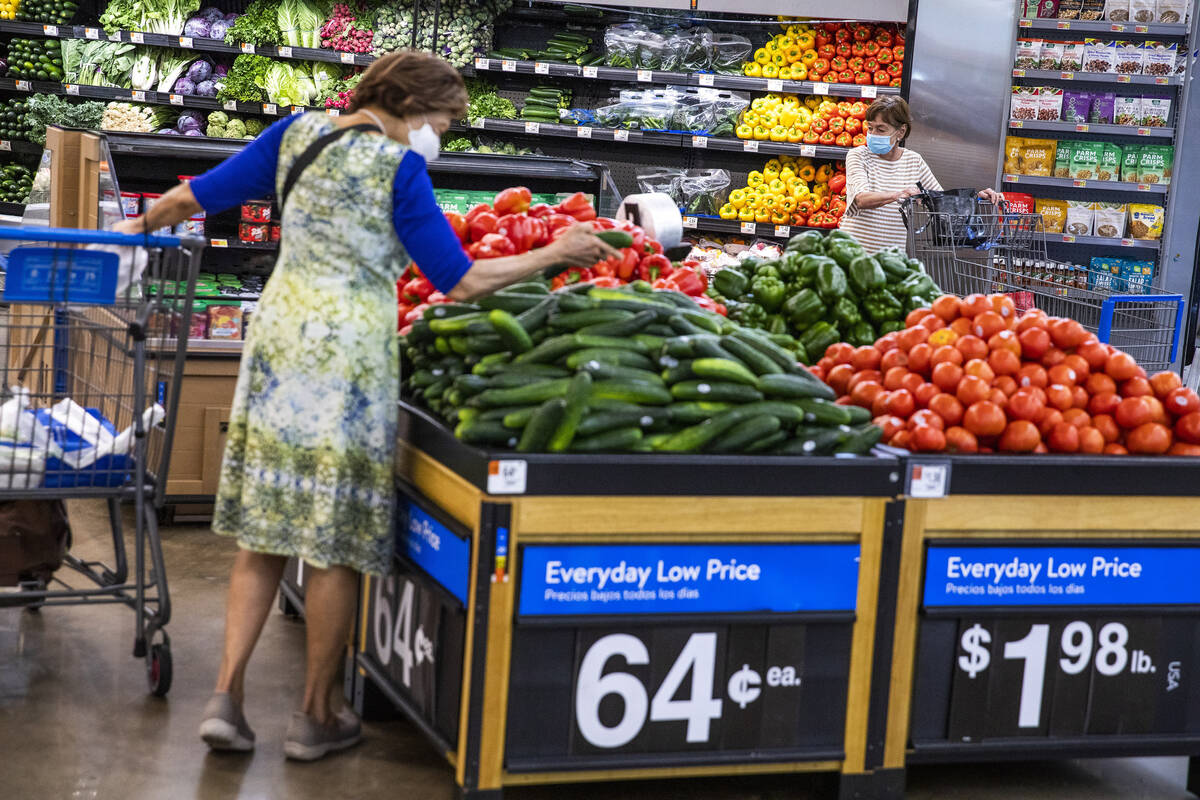 FILE - People buy groceries at a Walmart Superstore in Secaucus, New Jersey, July 11, 2024. (AP ...