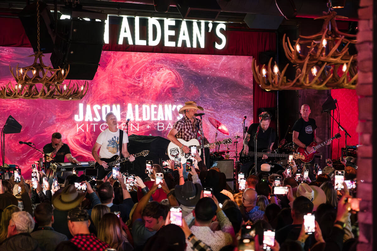 Jason Aldean performs at the opening party at Jason Aldean's Kitchen + Bar on the Strip on Thur ...