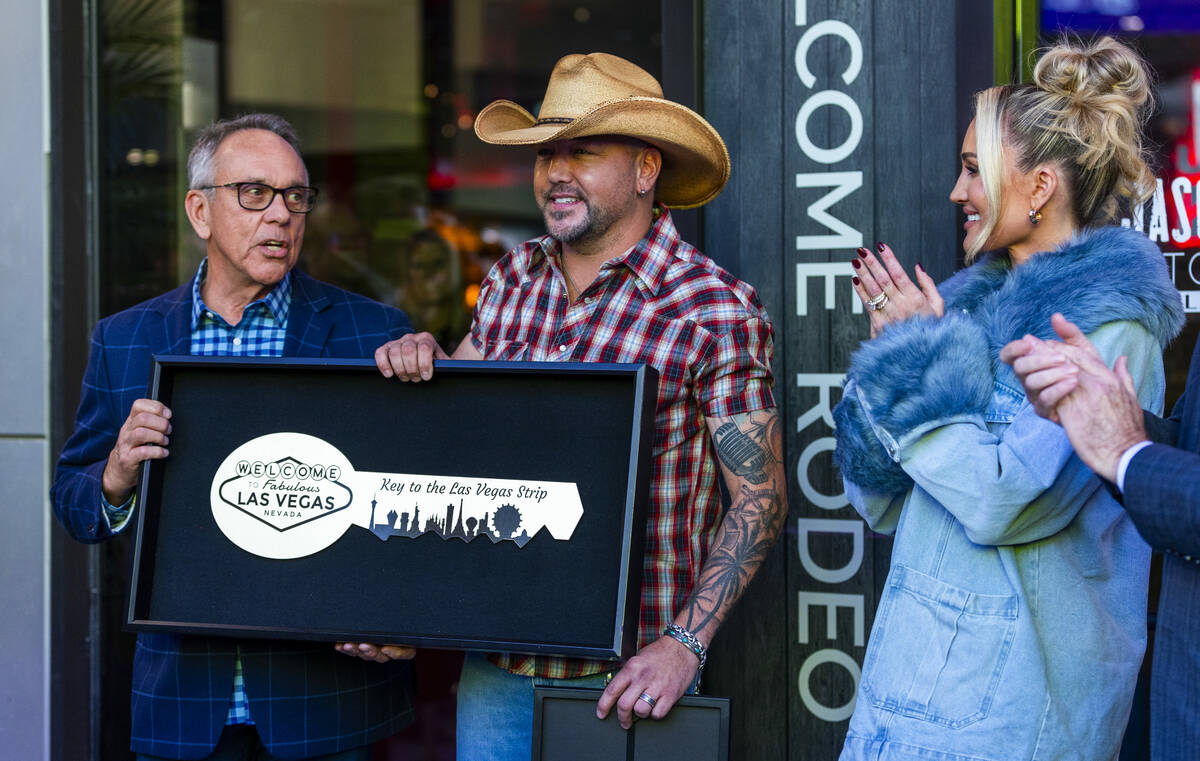 Clark County Commissioner Jim Gibson presents Jason Aldean with a Key to the Las Vegas Strip wh ...