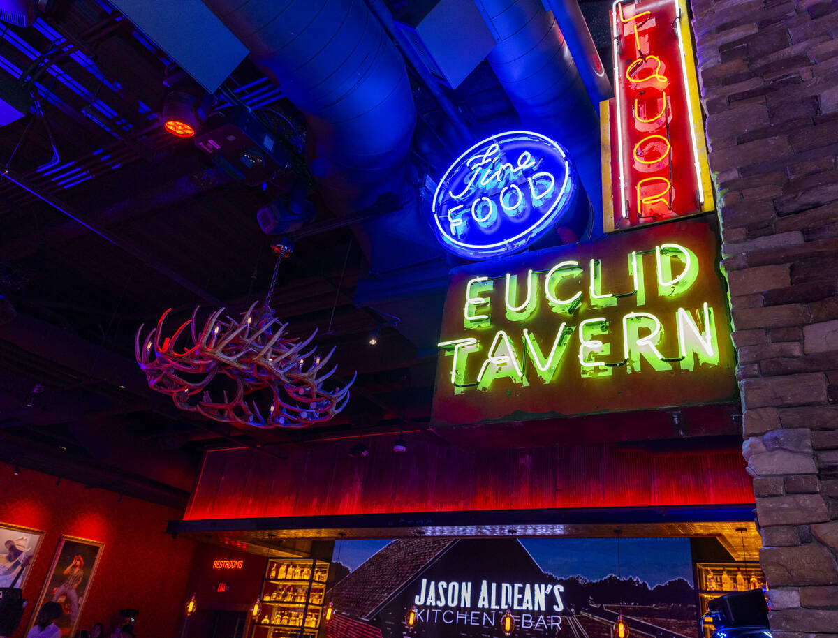 Neon signage illuminates many spaces within the new Jason Aldean’s Kitchen + Bar at 63 C ...