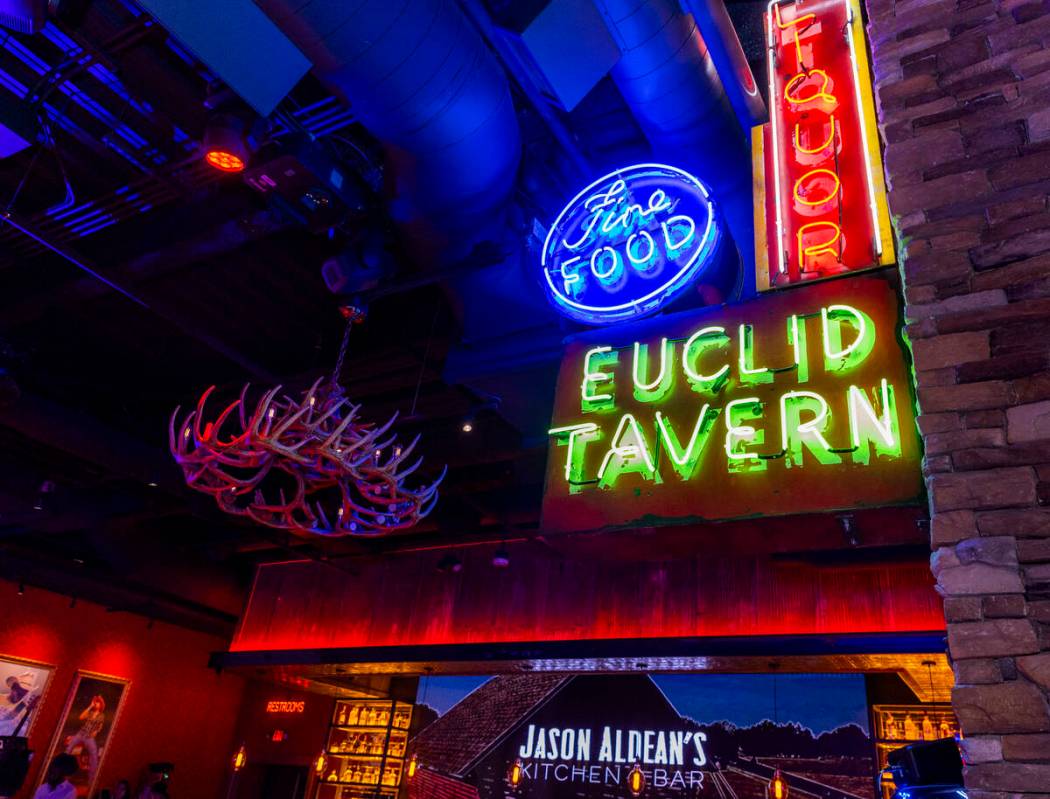 Neon signage illuminates many spaces within the new Jason Aldean’s Kitchen + Bar at 63 C ...