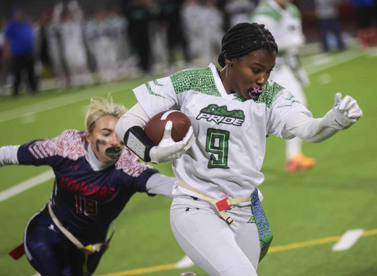 Green Valley's Kyndle Harris (9) runs the ball during a flag football game at Coronado High Sch ...