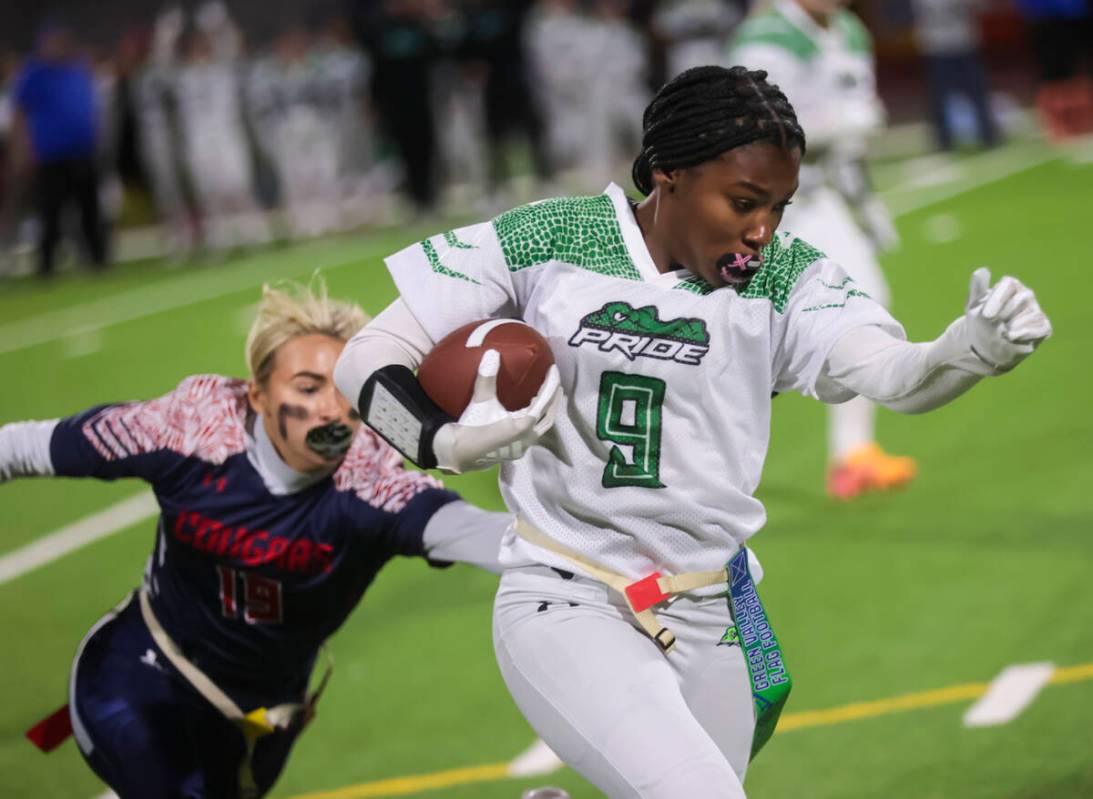 Green Valley's Kyndle Harris (9) runs the ball during a flag football game at Coronado High Sch ...