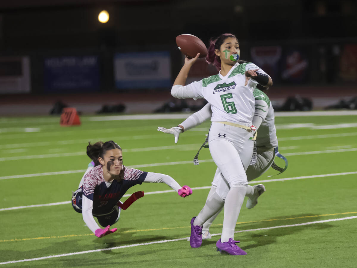 Green Valley's Daira Torres (6) throws a pass under pressure from Coronado during a flag footba ...