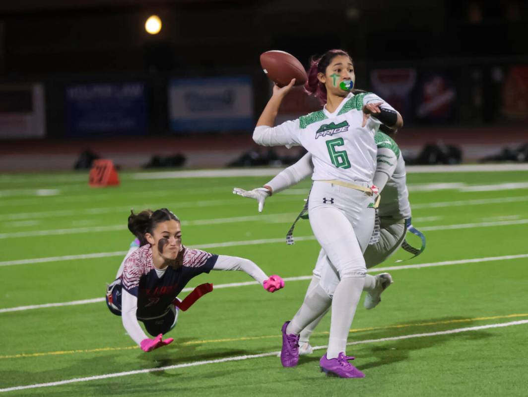 Green Valley's Daira Torres (6) throws a pass under pressure from Coronado during a flag footba ...