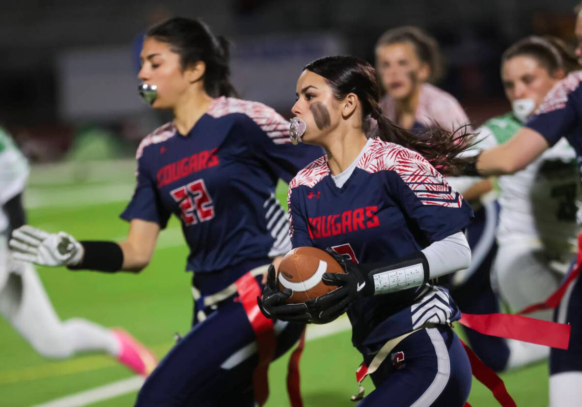 Coronado's Maddy Aguilar (2) runs the ball against Green Valley during a flag football game at ...